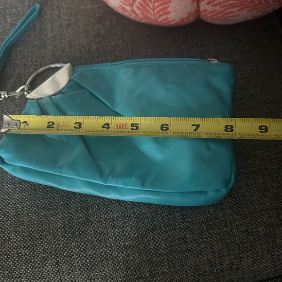 Turquoise Coin Pouch (Vinyl type Material) Interior has a zipper pouch area - Picture 4 of 11